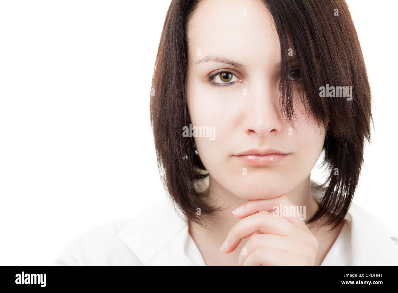 Brünette Frau Blick in die Kamera zu denken Stockfoto