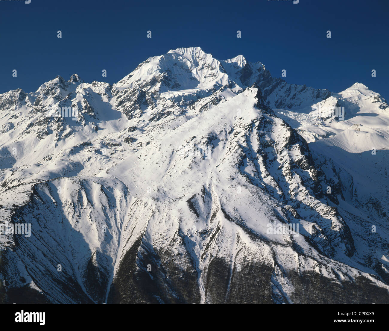 Licht auf dem Gipfel Naya Kanga, Langtang Region Nepal Himalaya Stockfoto