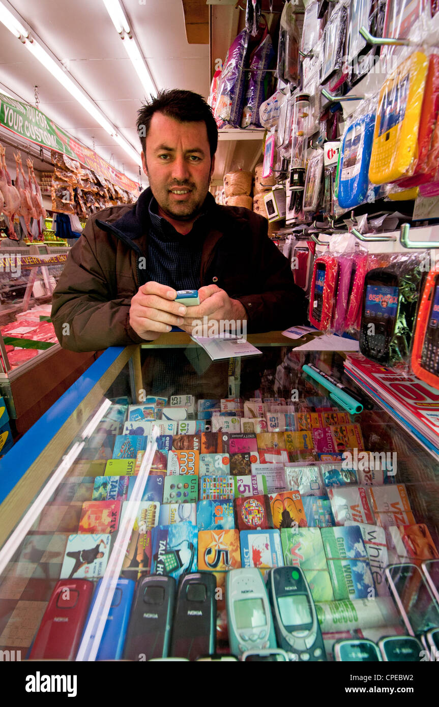 Loch in der Wand shop verkaufen billige Handys ein Produkte Stockfoto