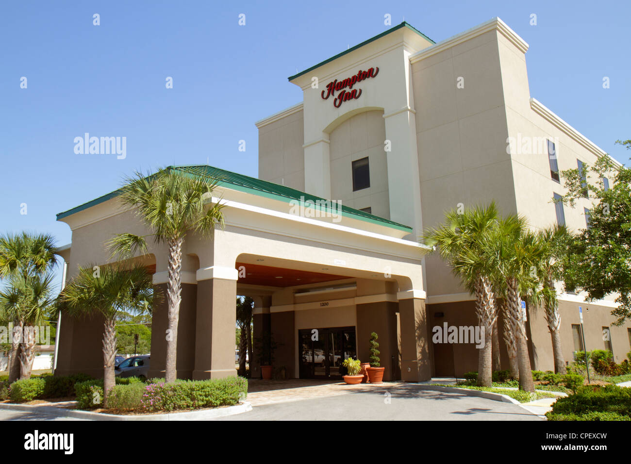 Okeechobee Florida, Hampton Inn, Motel, Hotel Hotels Unterkunft Inn Motel Motels, vorne, Eingang, außen vor, Eingang, Palmen, Besucher reisen t Stockfoto