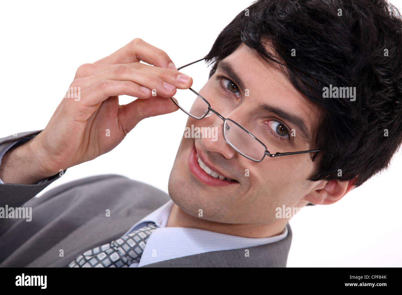 Unternehmer über seine Brille Stockfoto