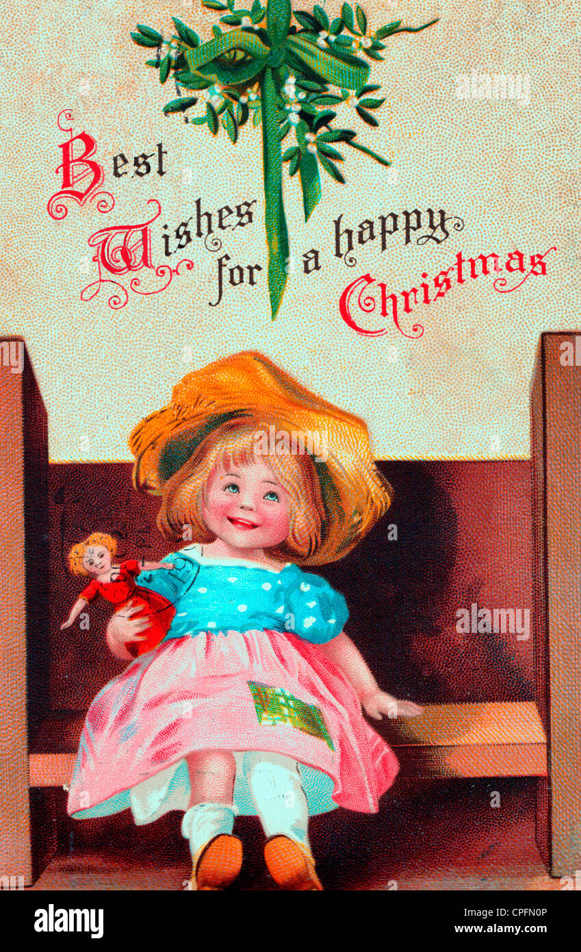Die besten Wünsche für ein frohes Weihnachtsfest - Little Girl Holding Puppe - Vintage Weihnachtskarte Stockfoto