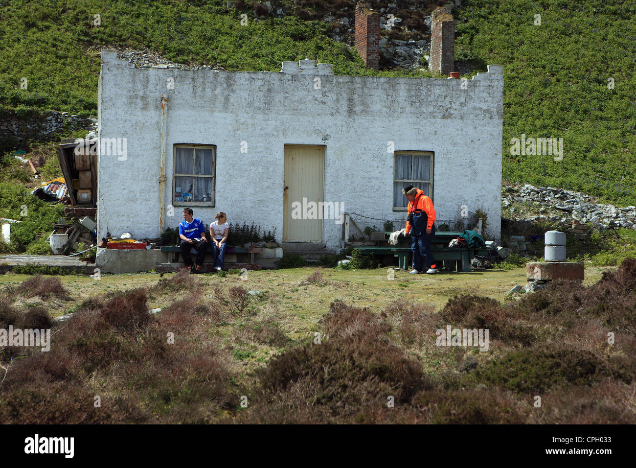 Unbewohnte Haus auf Ailsa Craig, auch bekannt als Paddy es Meilenstein, eine Insel in den Firth of Clyde in Schottland Stockfoto