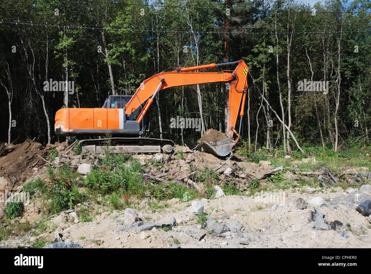Orange Bagger auf der Arbeit-Szene Stockfoto