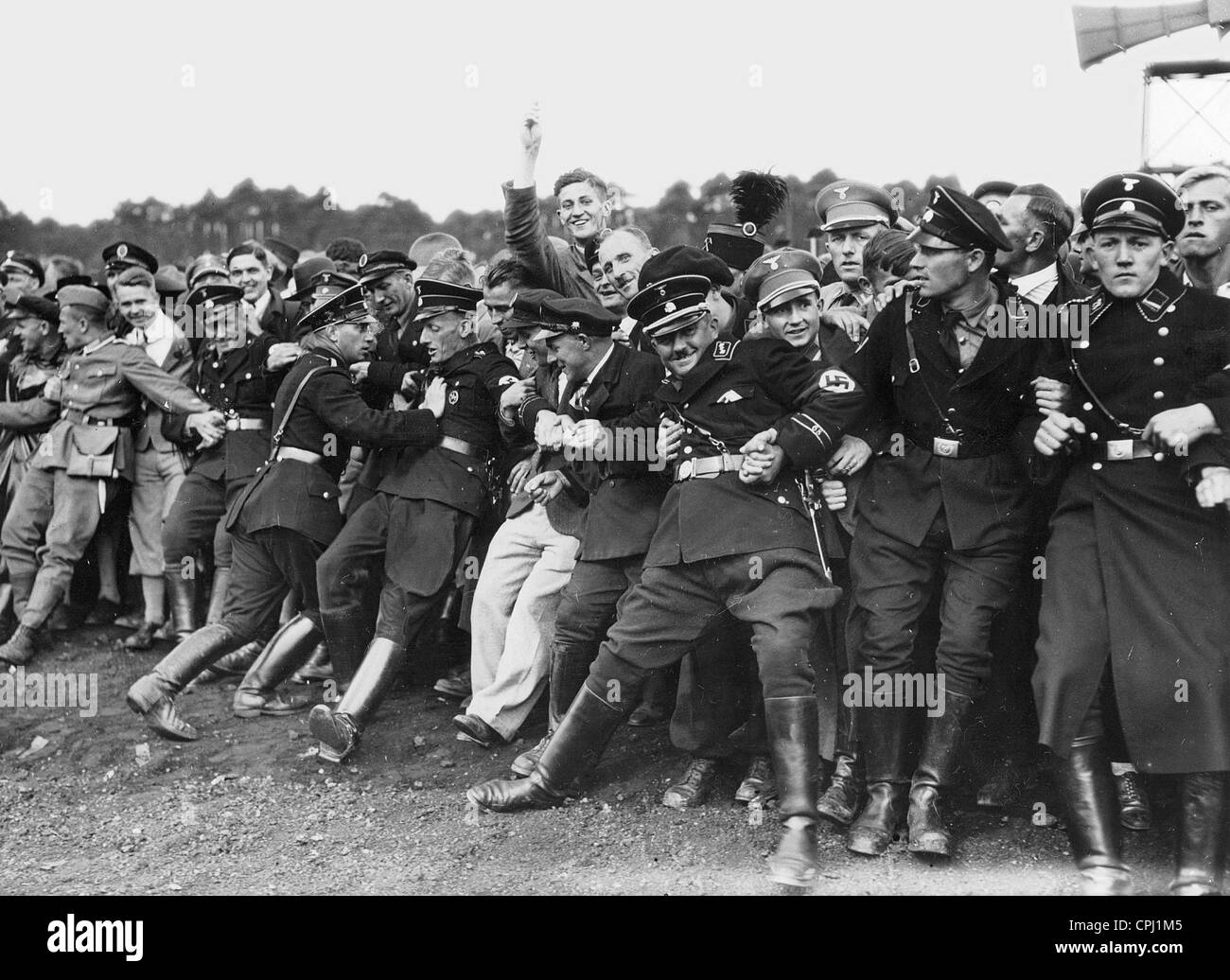 Absperr Teams zurückhalten die Masse auf dem Reichsparteitag 1935 Stockfoto