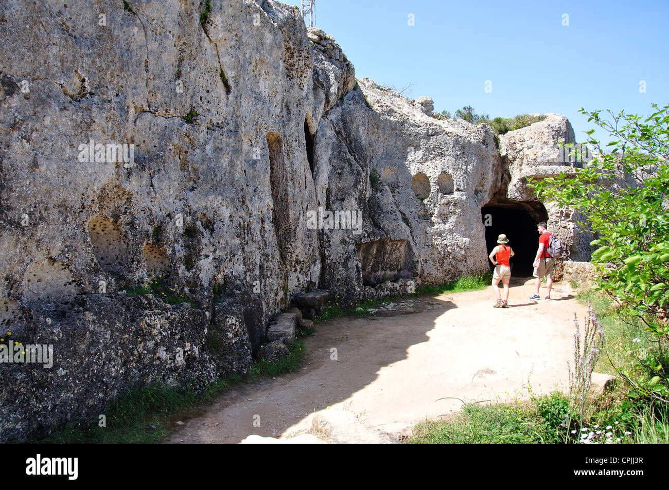 Höhlen in Cala Morell Nekropole archäologischen Stätte, Cala Morell, Menorca, Balearen, Spanien Stockfoto