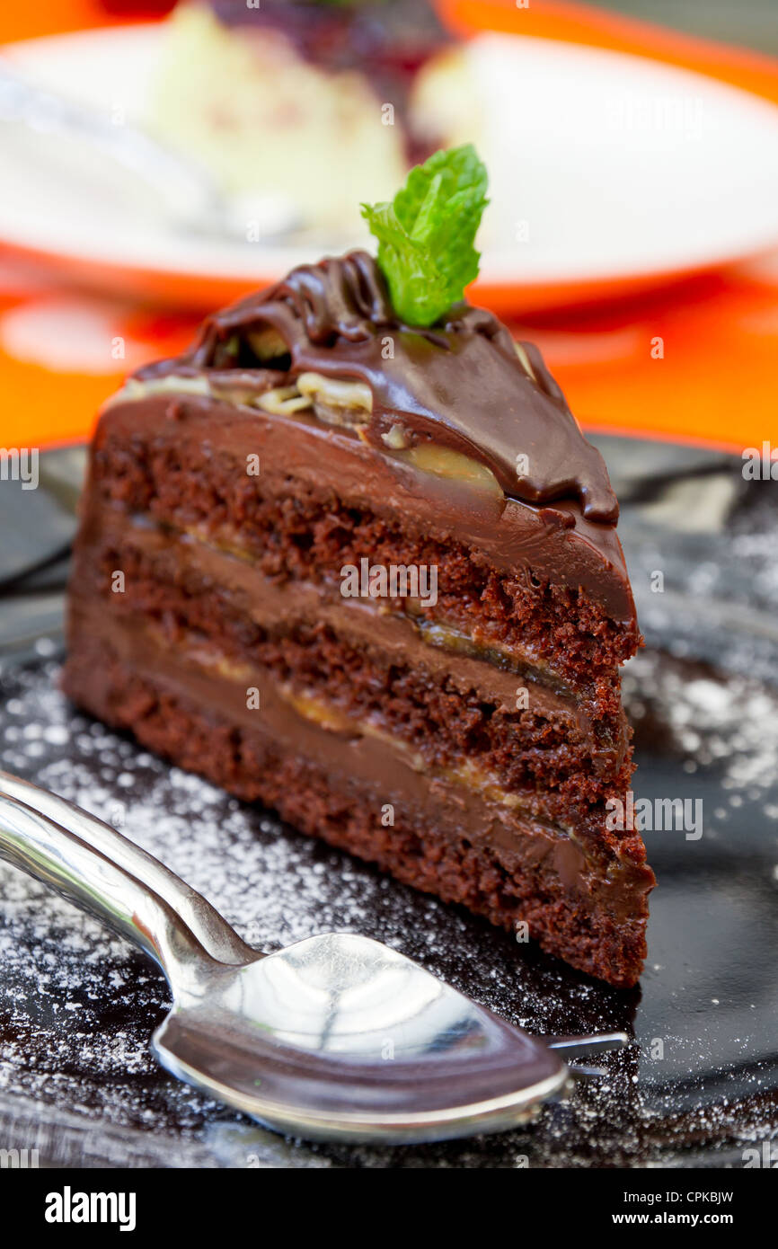 Schokolade Kuchen und Tee-Löffel Stockfoto