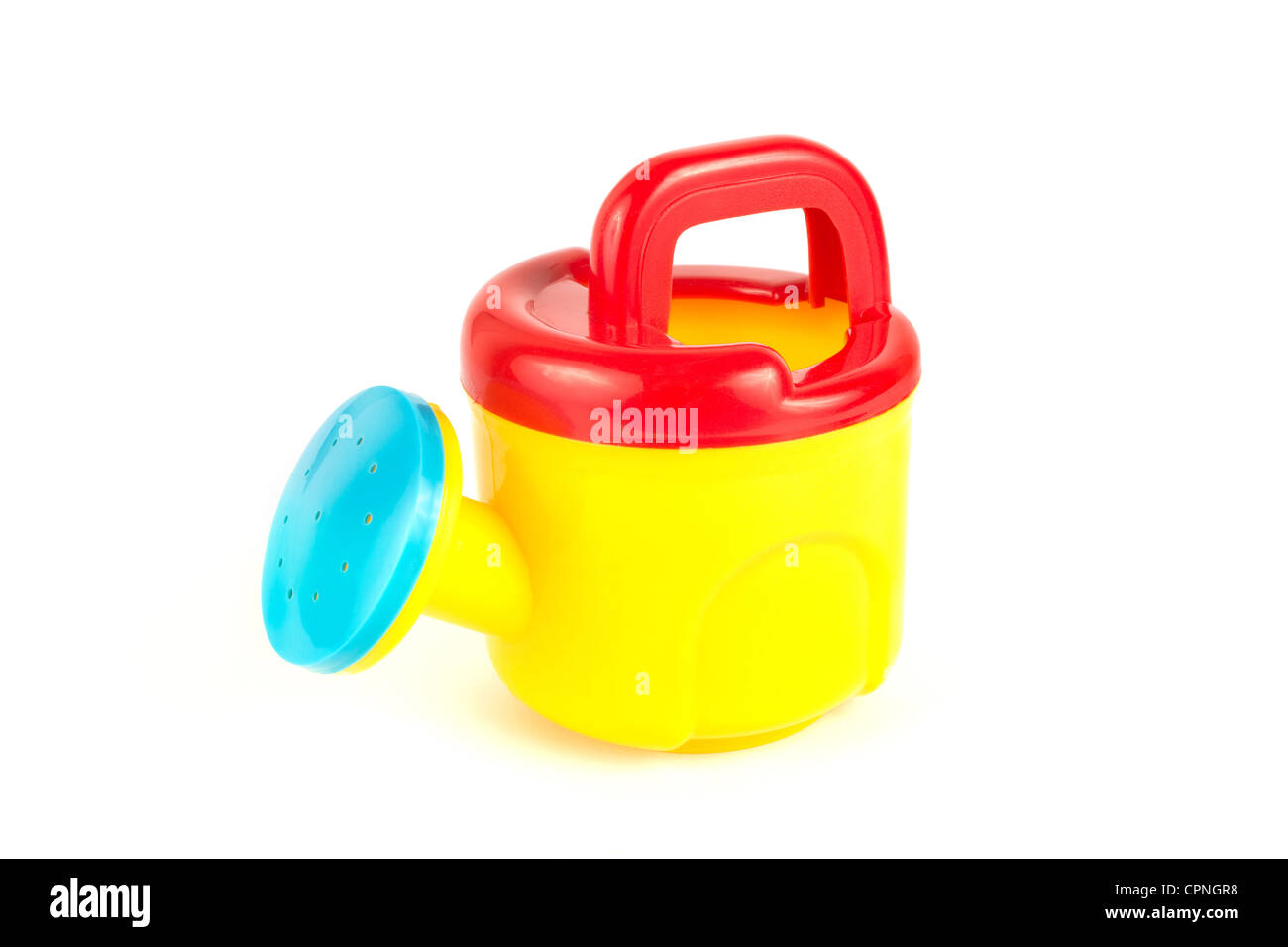 Rote und gelbe Kunststoff-Spielzeug Gießkanne auf weiß Stockfoto