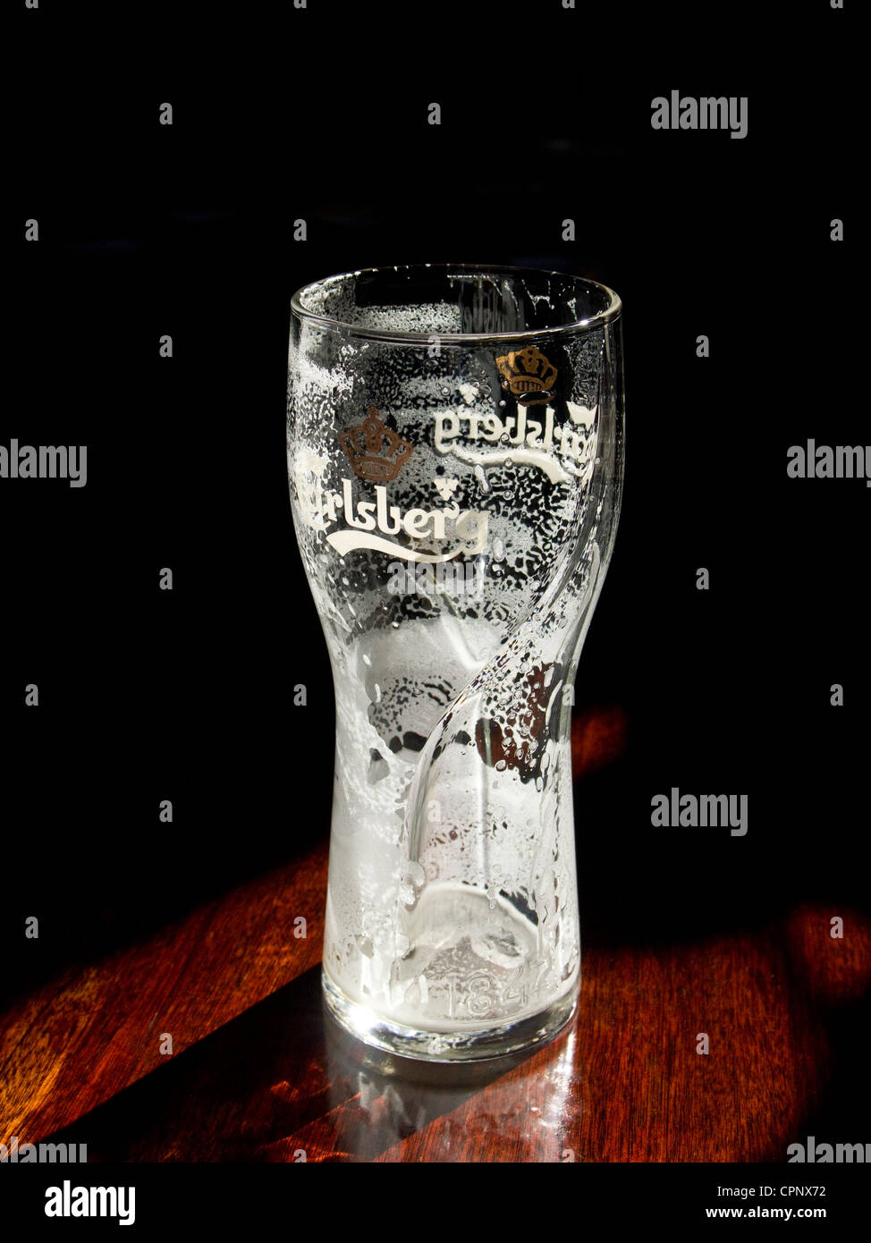 Leeres Bierglas - Carlsberg Lager Pint Glas Stockfoto