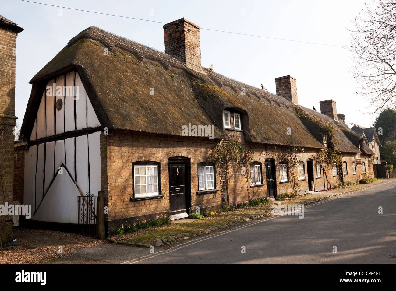 Houghton Dorf Reetdachhaus. Stockfoto