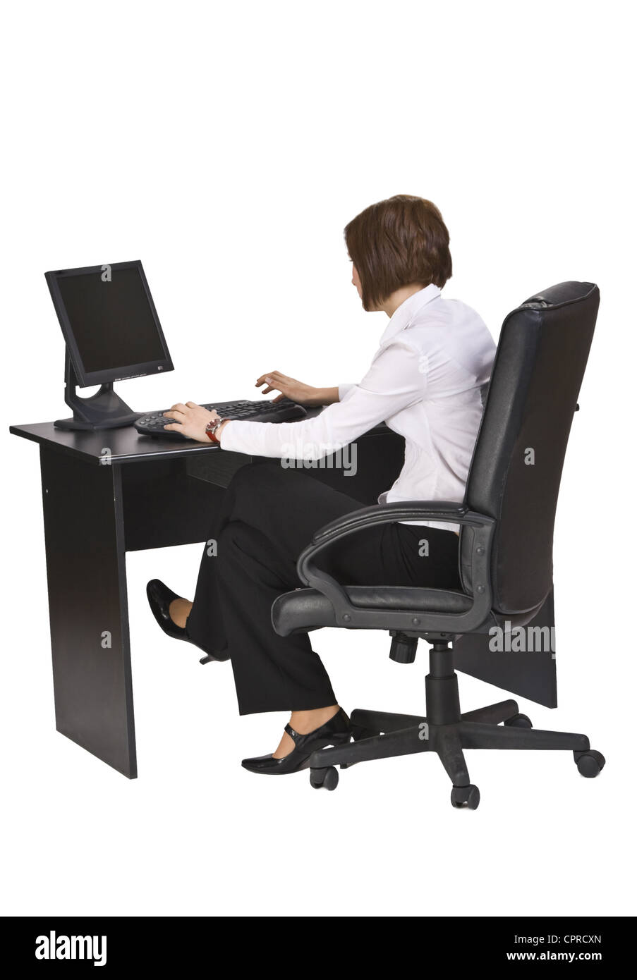 Junge Unternehmerin an ihrem Schreibtisch arbeiten am Computer. Stockfoto