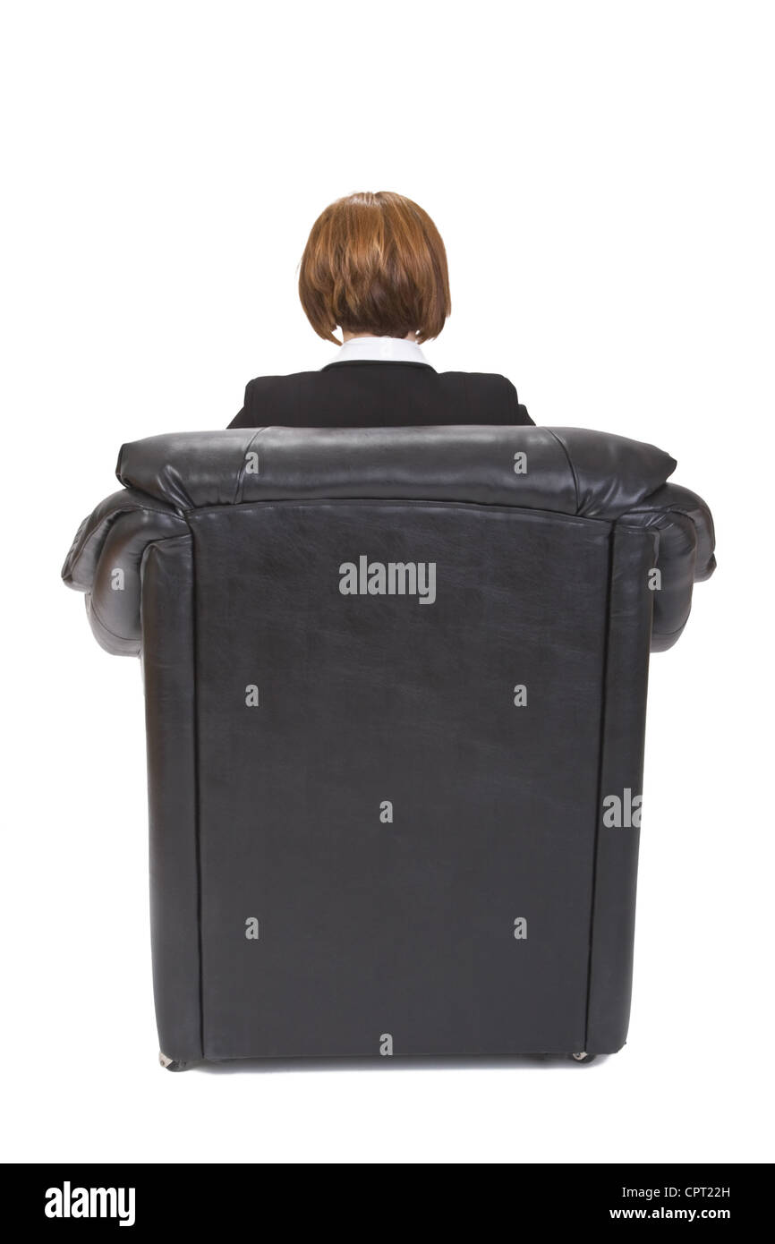 Hinten Bild eine Geschäftsfrau in einem Sessel sitzend. Stockfoto