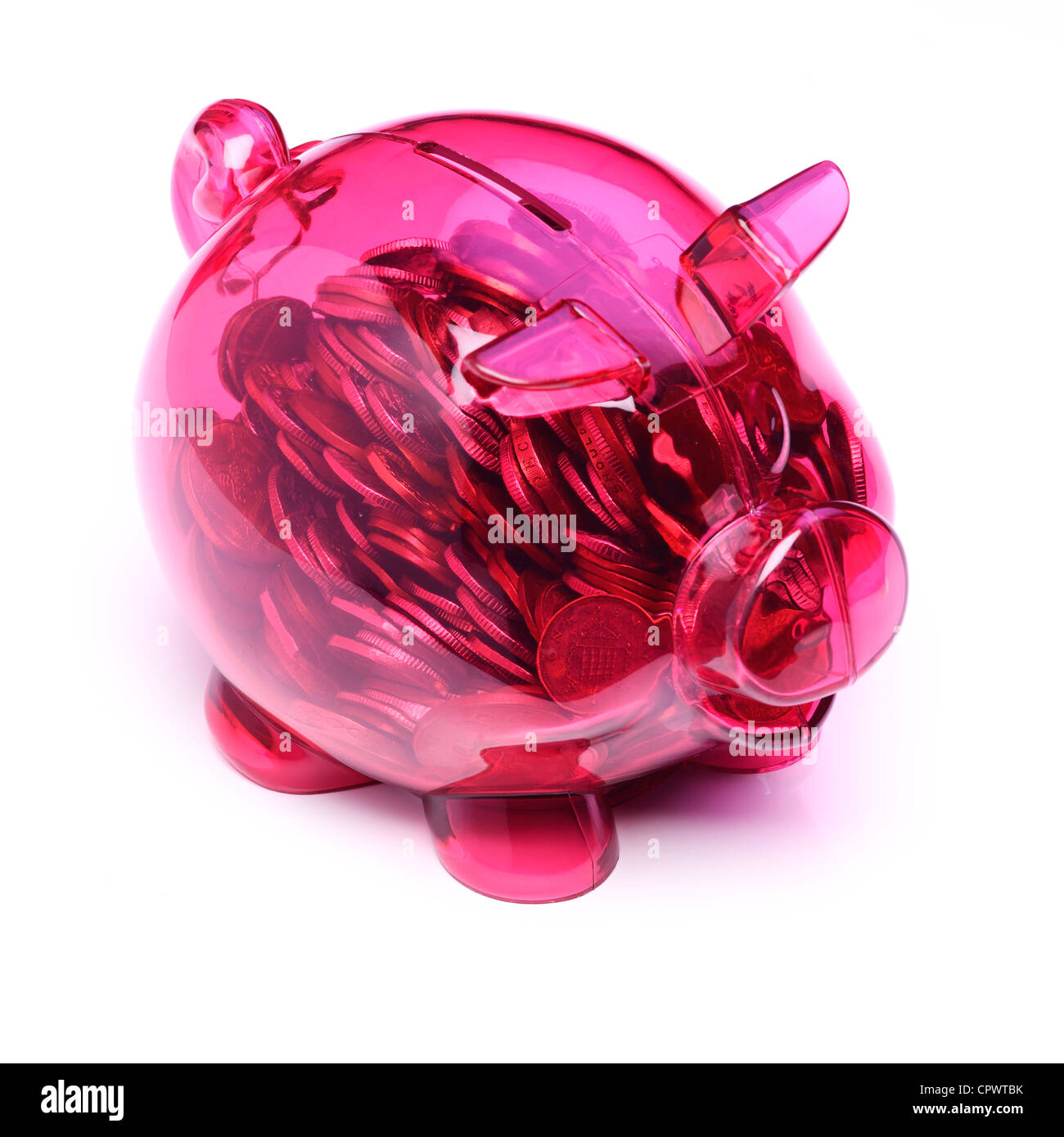 Transparente rosa Kunststoff Sparschwein voller Münzen Stockfoto