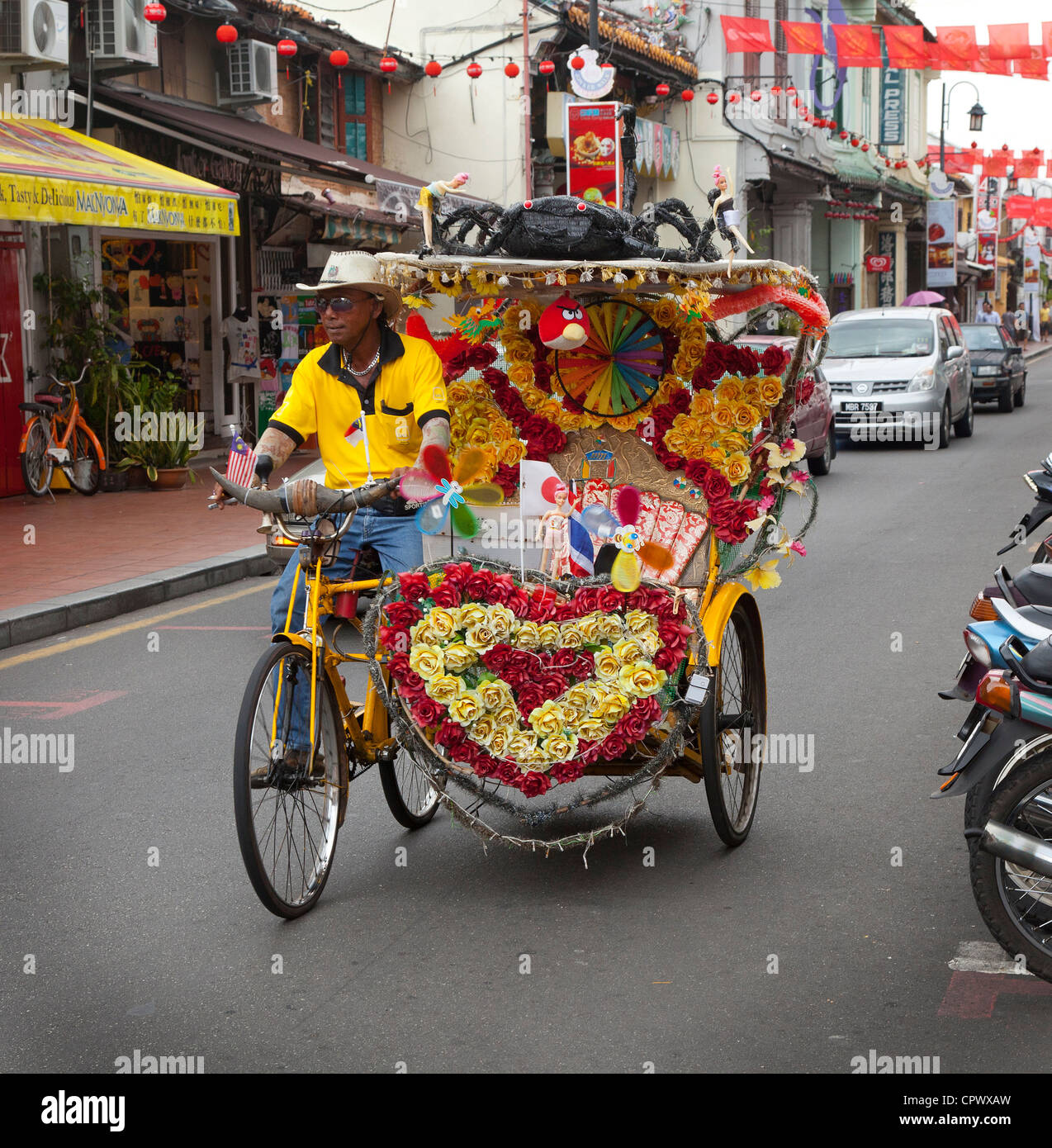 Sehr bunte Fahrradrikschas, Melaka, Malaysia, Stockfoto