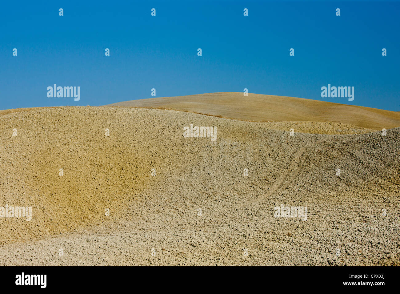 Toskanischen ausgedörrte Landschaft sonnenverbrannte Erde in Val D'Orcia, Toskana, Italien Stockfoto