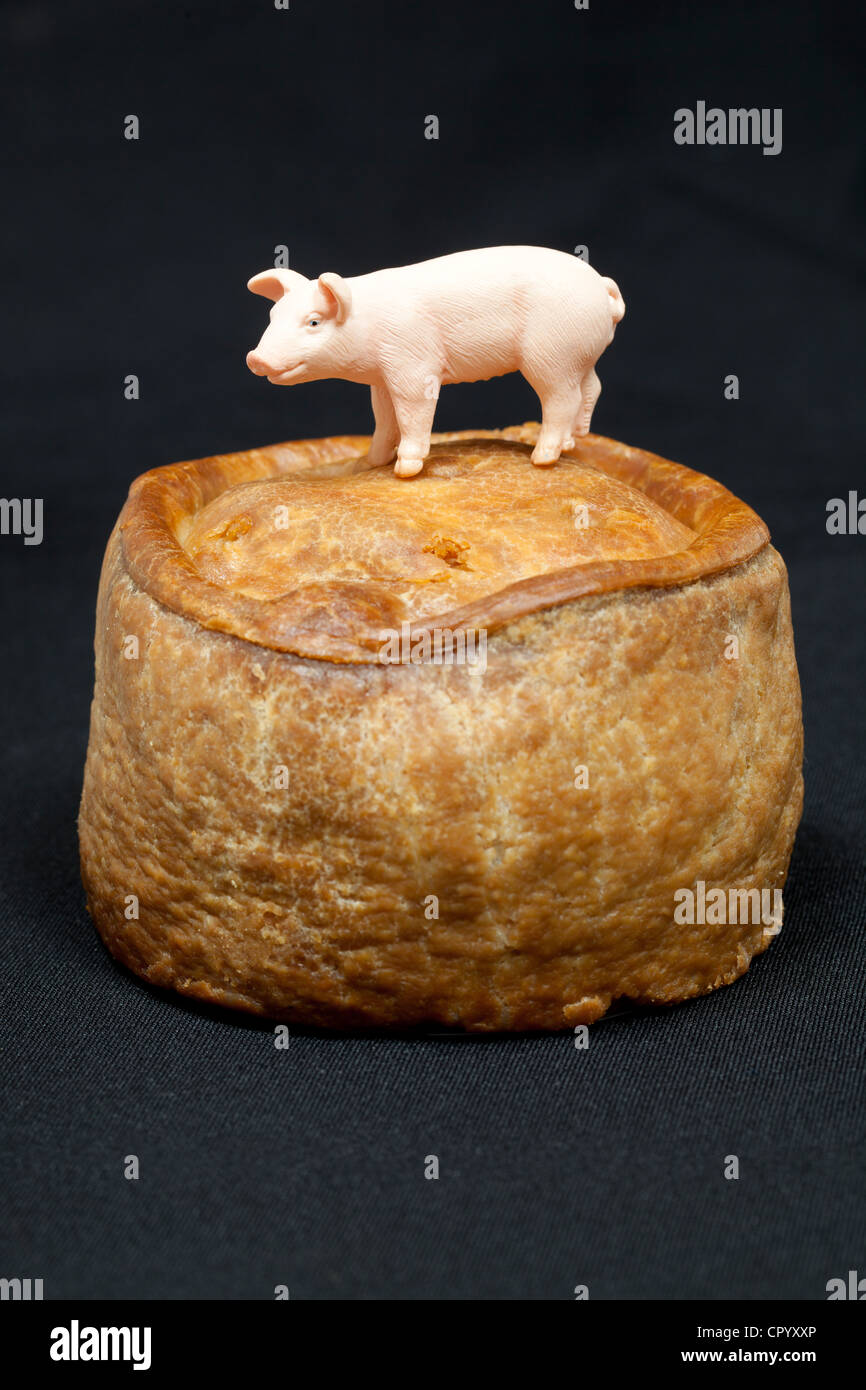 Pork Pie mit Modell-Schwein Stockfoto