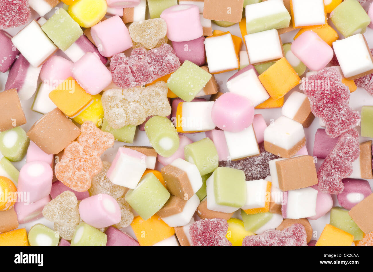 Nahaufnahme des Hintergrunds des Zucker bestäubt, Gelees und Dolly Mischung süß Süßwaren - Studio gedreht Stockfoto