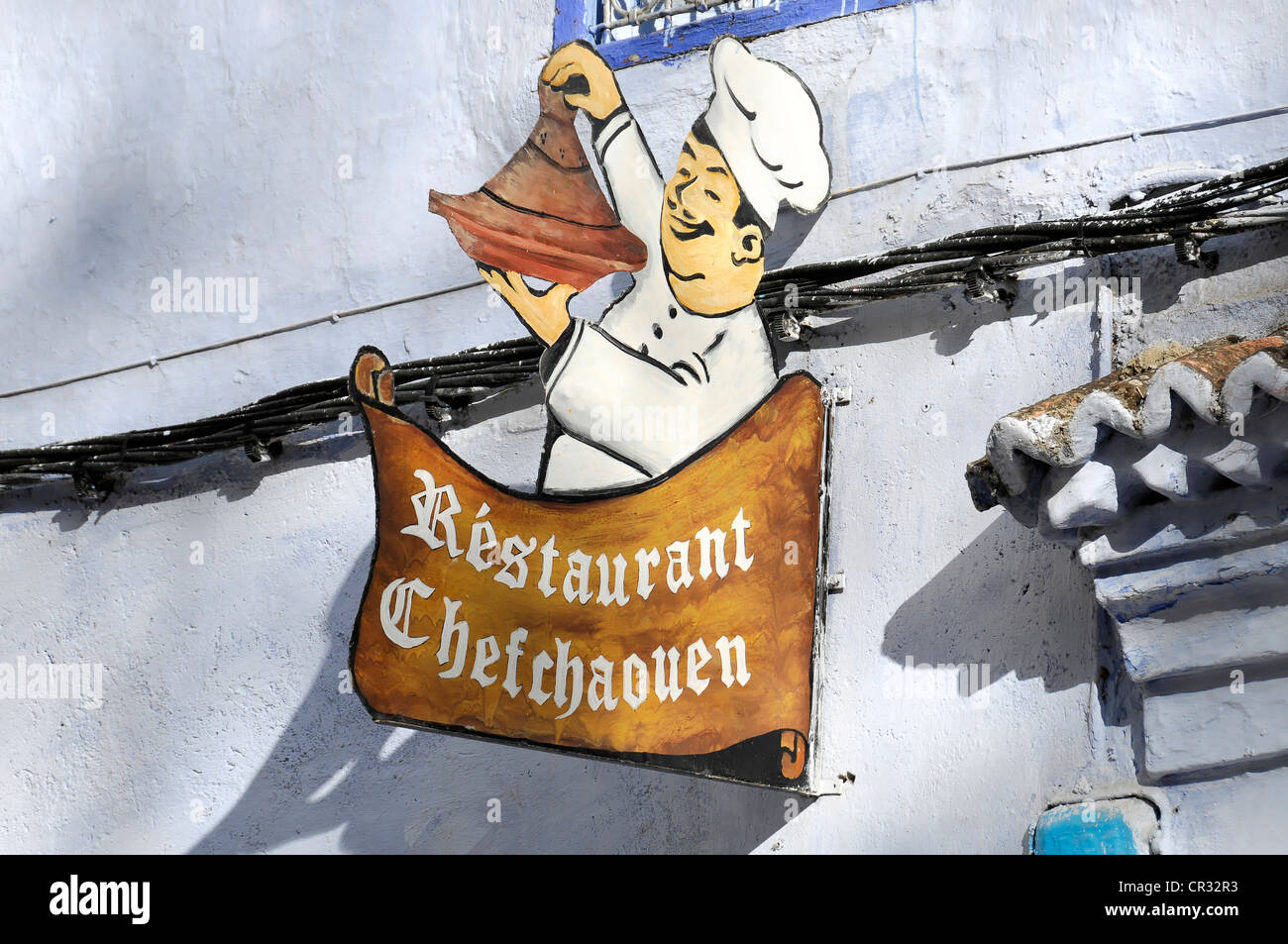 Zeichen, Restaurant Chefchaouen, mit einem Koch mit einer Platte, Chefchaouen, Marokko, Marokko, Nordafrika Stockfoto
