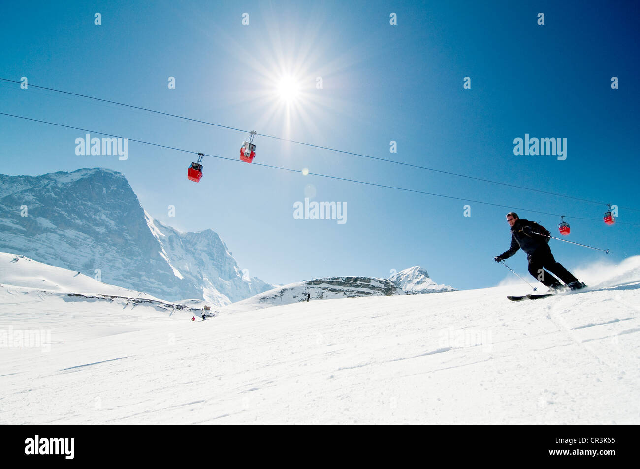 Skifahrer auf Maennlichen Berg, Grindelwald, Kanton Bern, Berner Oberland, Schweiz, Europa Stockfoto