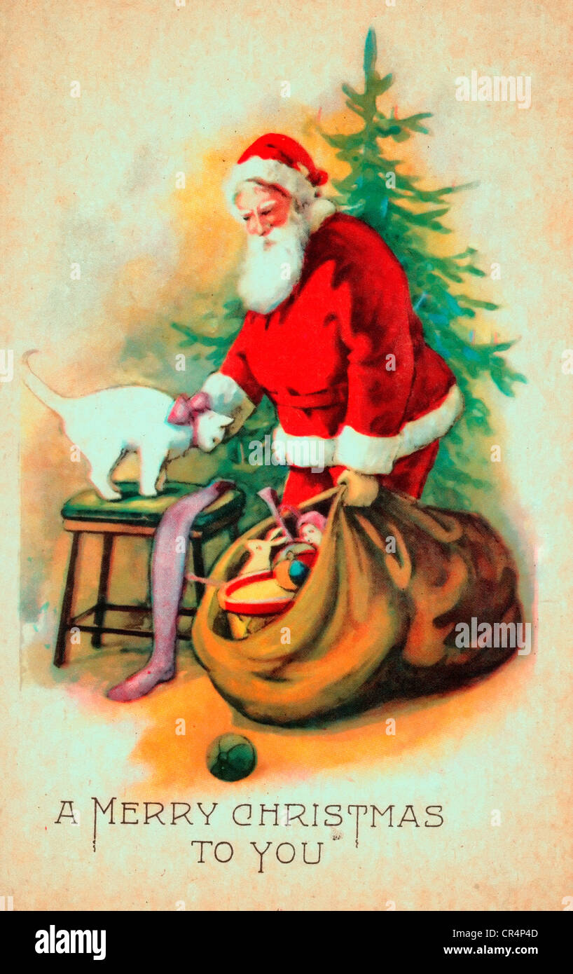 Ein frohes Weihnachtsfest für Sie - Vintage-Karte mit Santa Claus streicheln einer Katze mit Weihnachtsbaum im Hintergrund Stockfoto