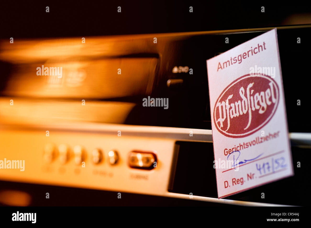 Gerichtsvollzieher Kaution Siegel auf einem elektronischen Gerät, Deutschland Stockfoto
