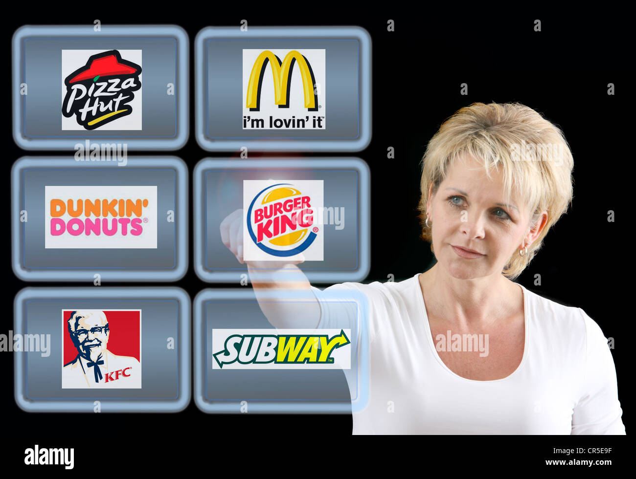 Virtuelle Bildschirme, touch-Screens. Fast Food-Ketten und Restaurants. Symbolisches Bild. Stockfoto