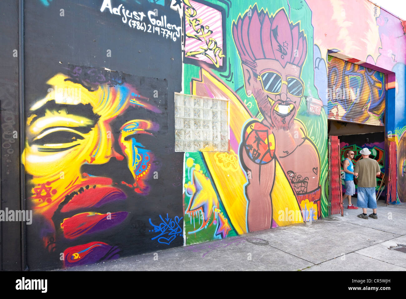 USA Florida Miami Wynwood Bezirk anpassen Kunstgalerie mit einem Tag an der Fassade mit Jimmy Hendrix Künstlers Dexos Stockfoto