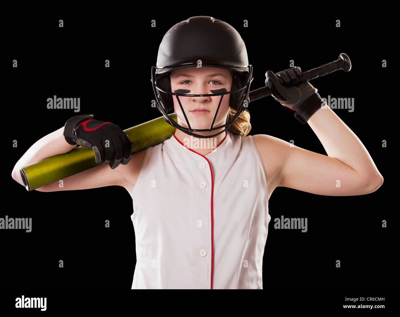 Porträt von Mädchen (12-13) verkehrende Softball, Studio gedreht Stockfoto
