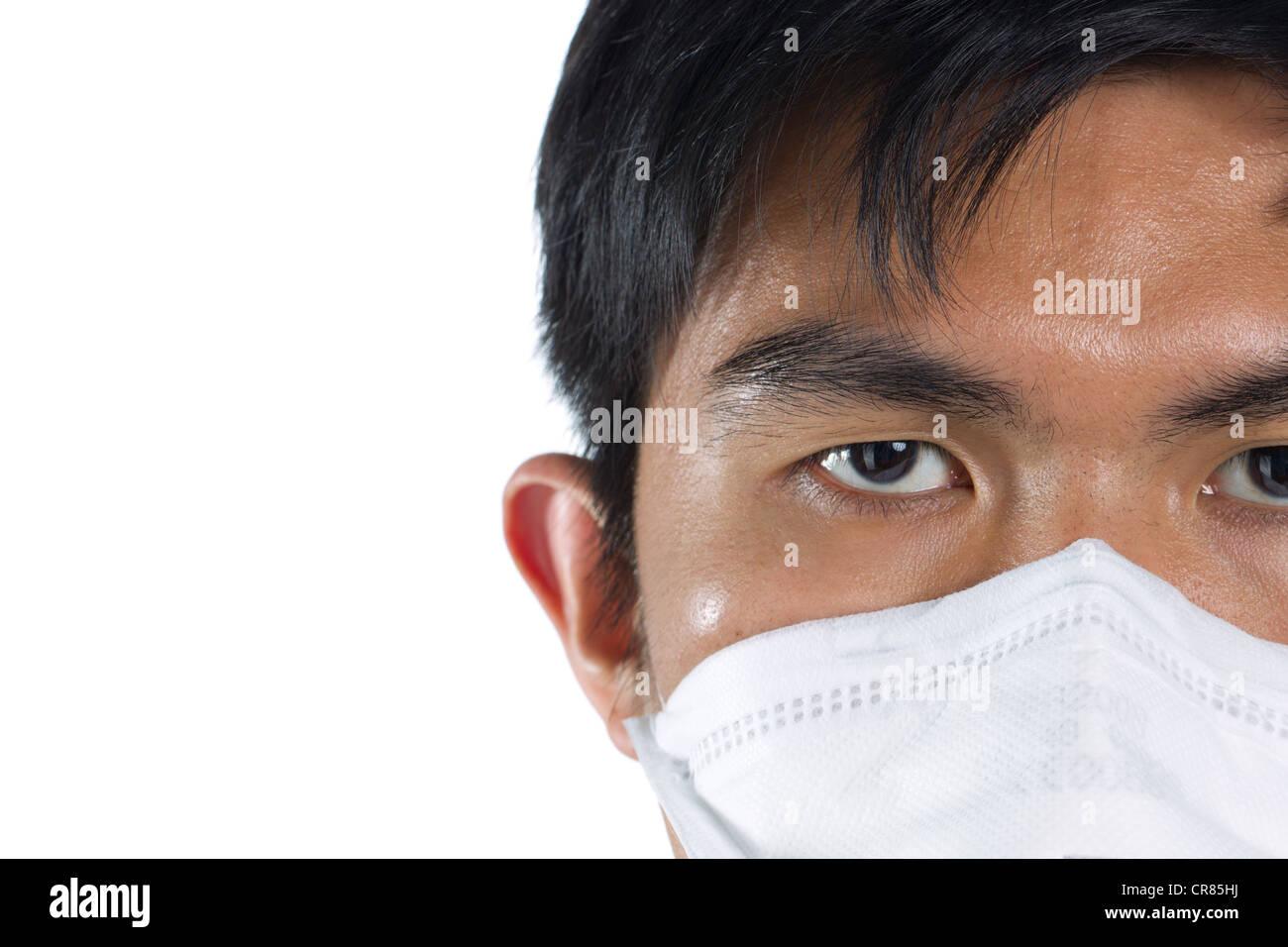 Close-up Portrait eines Mannes einen Mundschutz tragen Stockfoto