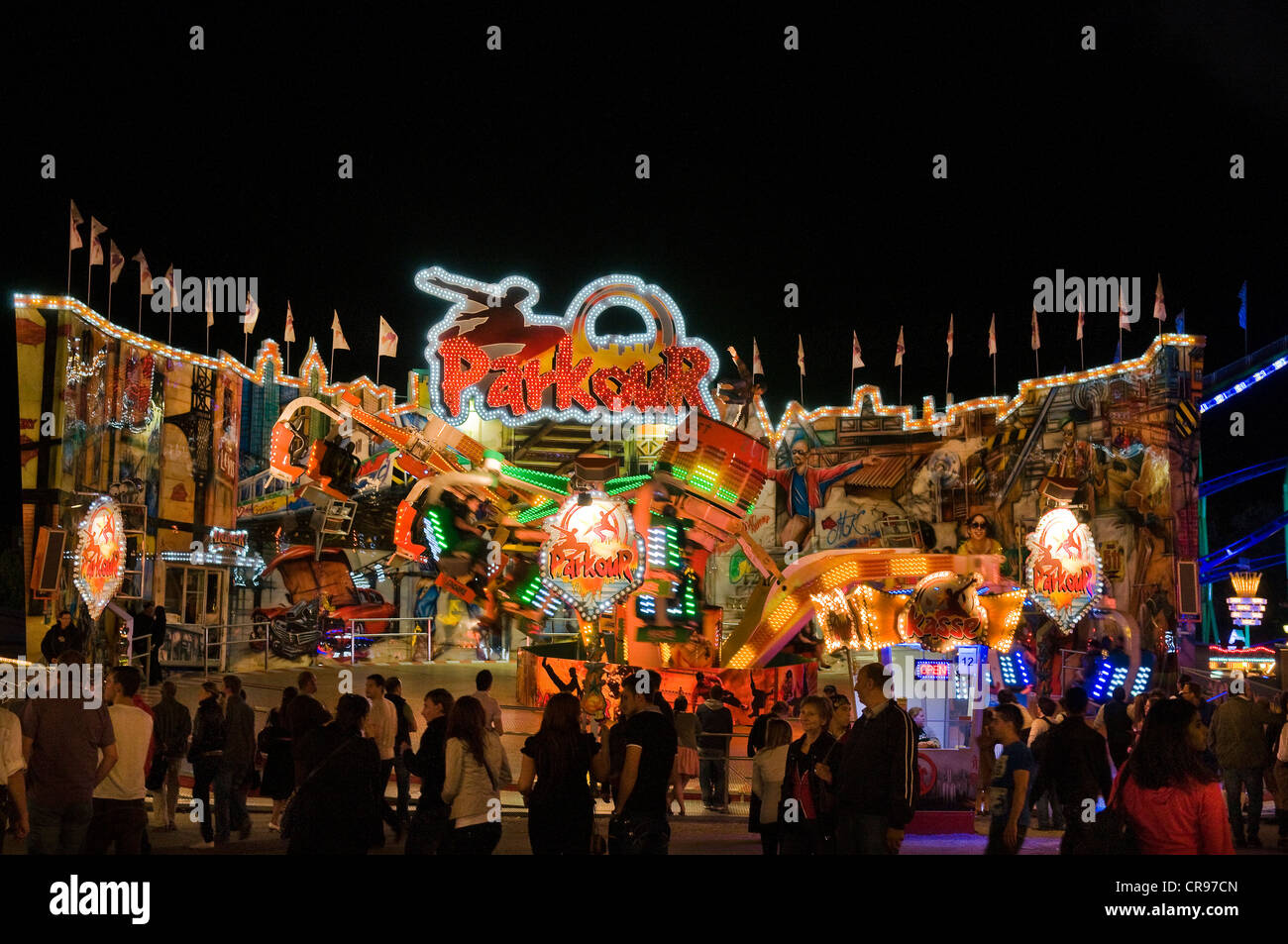 Oktoberfest, Wiesn, Parkour, eine rotierende Fahrgeschäft bei Nacht, Munich, Bavaria, Germany, Europe Stockfoto