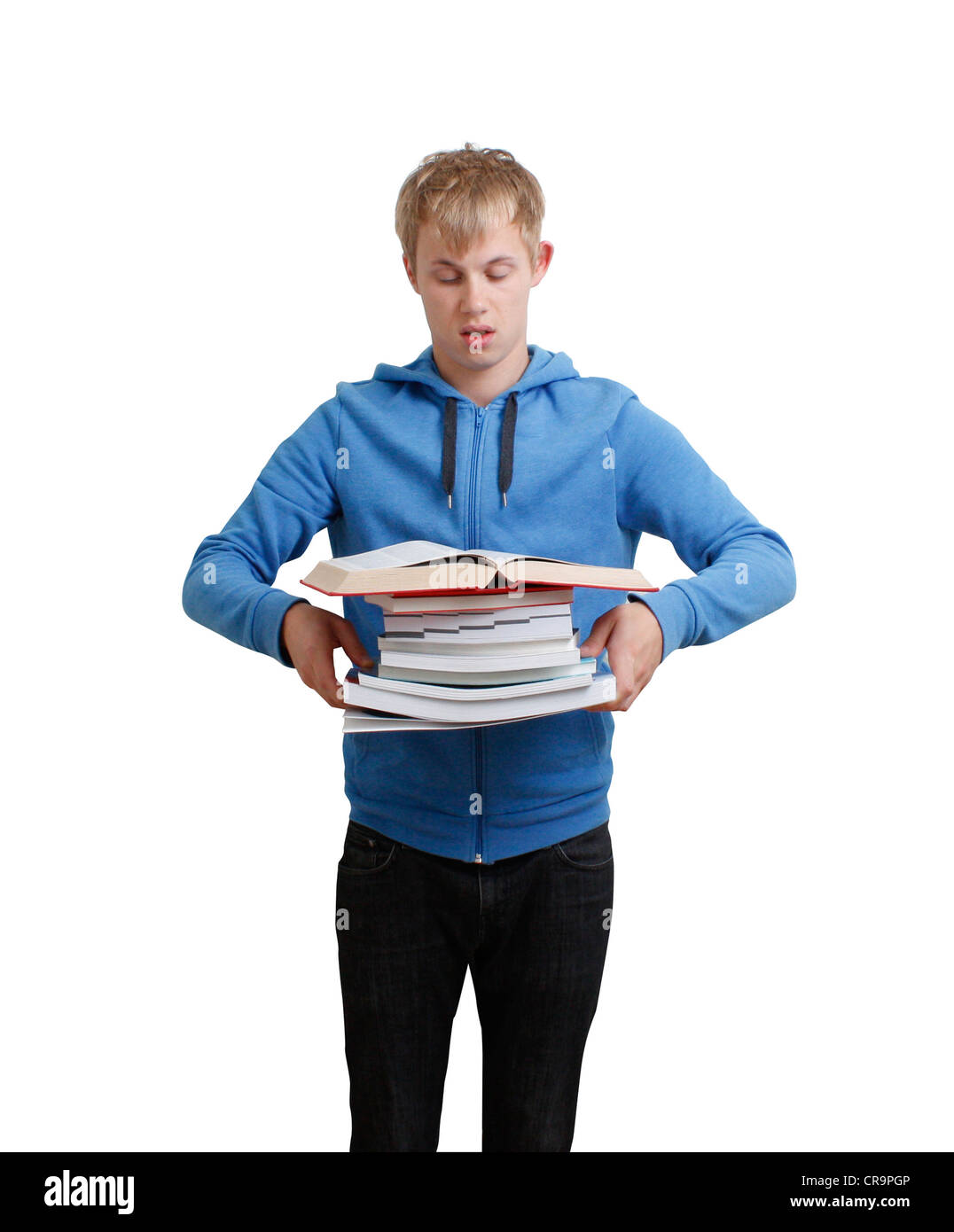 Ein Teenager mit einem Stapel Bücher Stockfoto