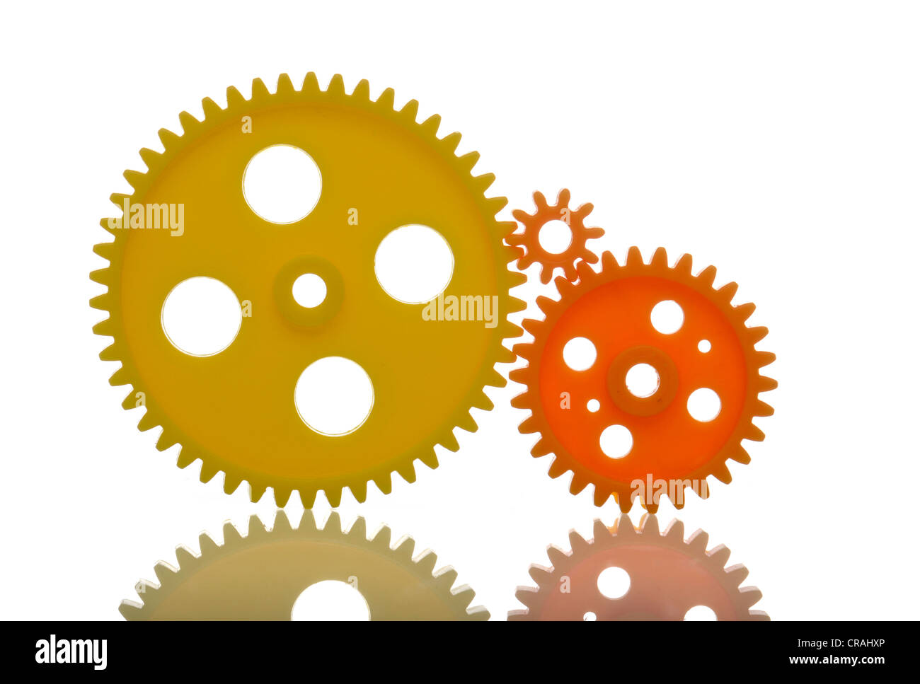 Gelb und orange Zahnräder, symbolisches Bild Stockfoto