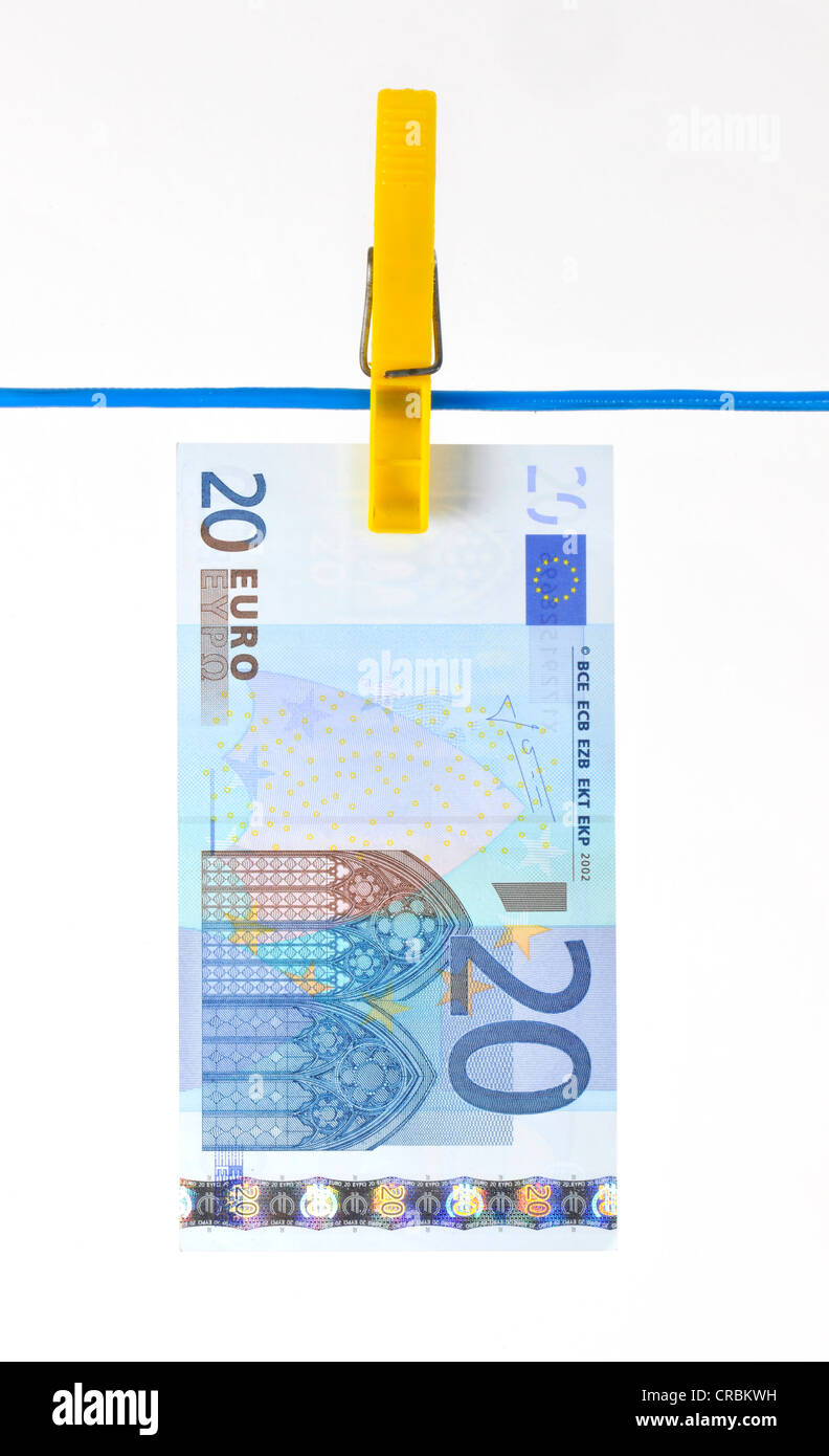 Euro-Banknote auf einer Wäscheleine, symbolisches Bild für Geldwäsche, schmutziges Geld Stockfoto
