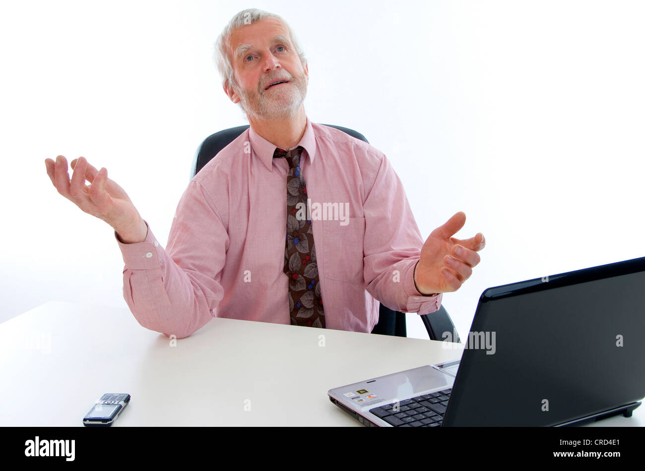 ältere, überforderten Geschäftsmann mit laptop Stockfoto