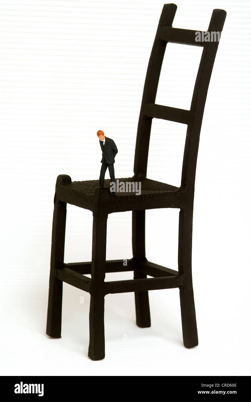 symbolisch für Stuhl Mann Stockfoto