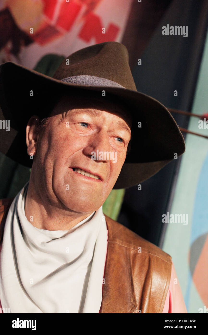 Schauspieler John Wayne als Replikat Wachsfigur bei Madame Tussauds Wachsfigurenkabinett, Times Square. Stockfoto