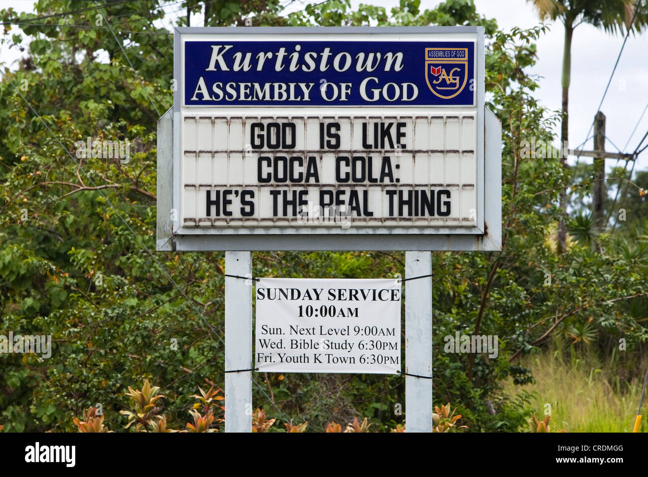 Eine Kirche Seufzer sagen "Gott ist wie Coca Cola, er ist das einzig wahre", Banana, Hawaii, USA Stockfoto