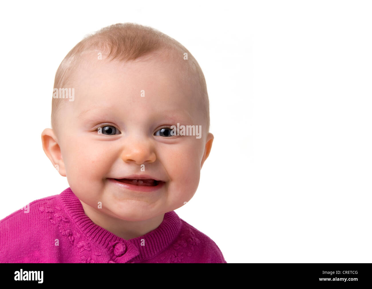 Fröhliches 7 Monate alten Baby Mädchen lächelnd Stockfoto