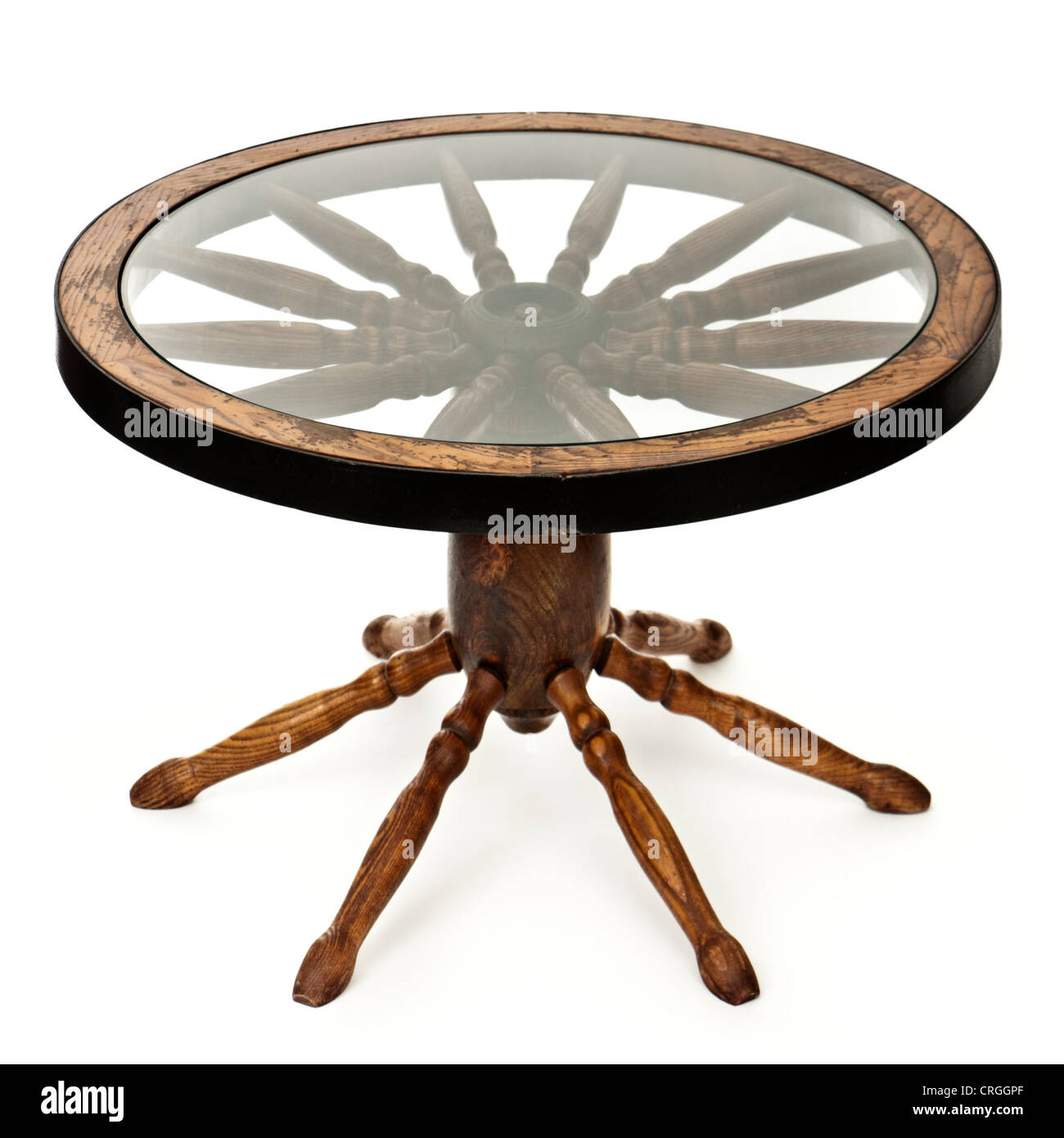 Antike rund konvertiert Wagenrad Couchtisch Stockfoto