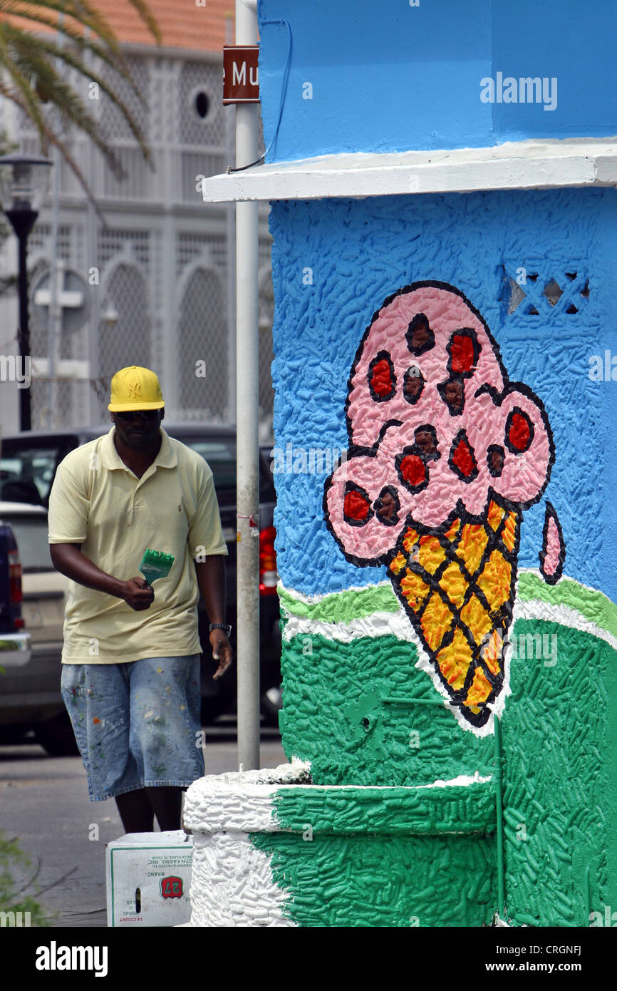 Mann Malerei Eis Kornett an einer Wand, Niederländische Antillen, Willemstad, Curacao, Punda Stockfoto