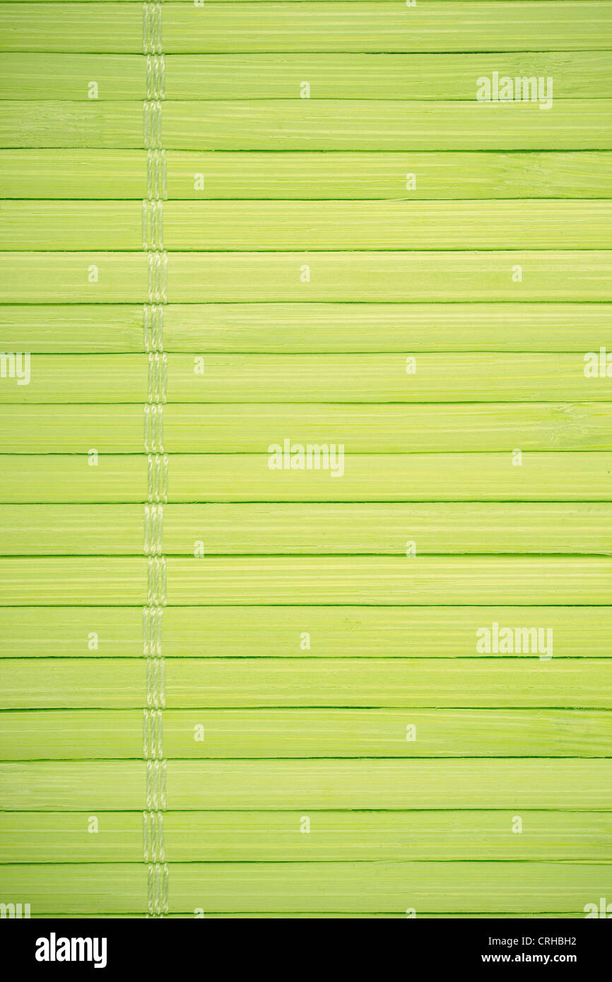 grüne Holzstäbchen Hintergrund, Faden zwischen Rand und Hintergrund Stockfoto