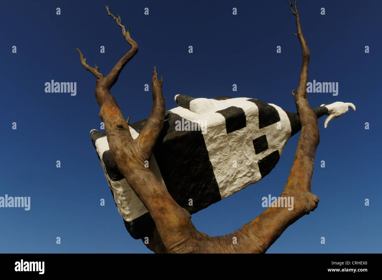 Kuh auf einen Baum von John Kelly in Melbourne Docklands Stockfoto