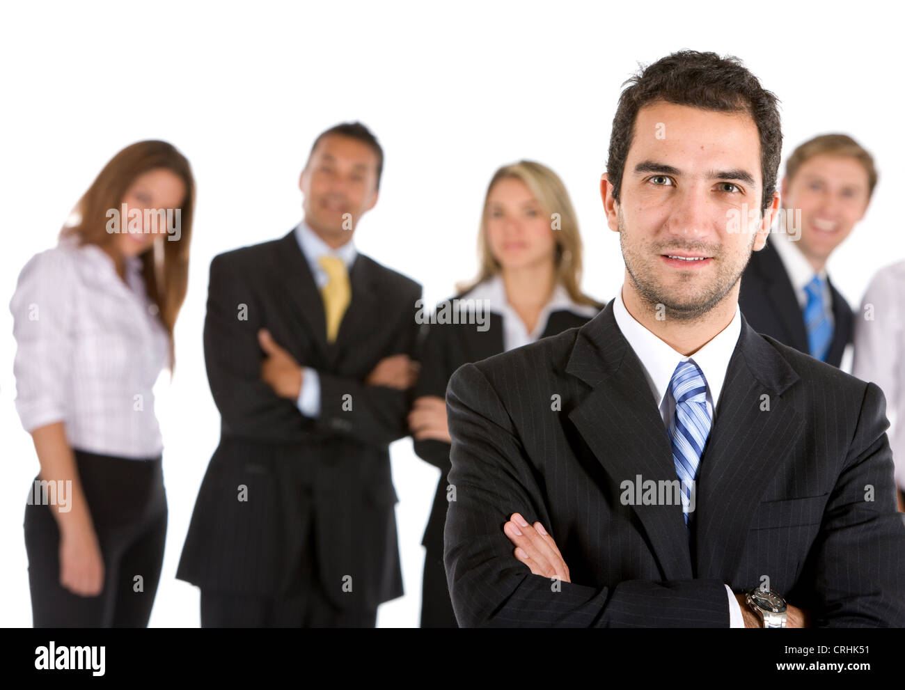 junger Geschäftsmann stand vor seinem team Stockfoto