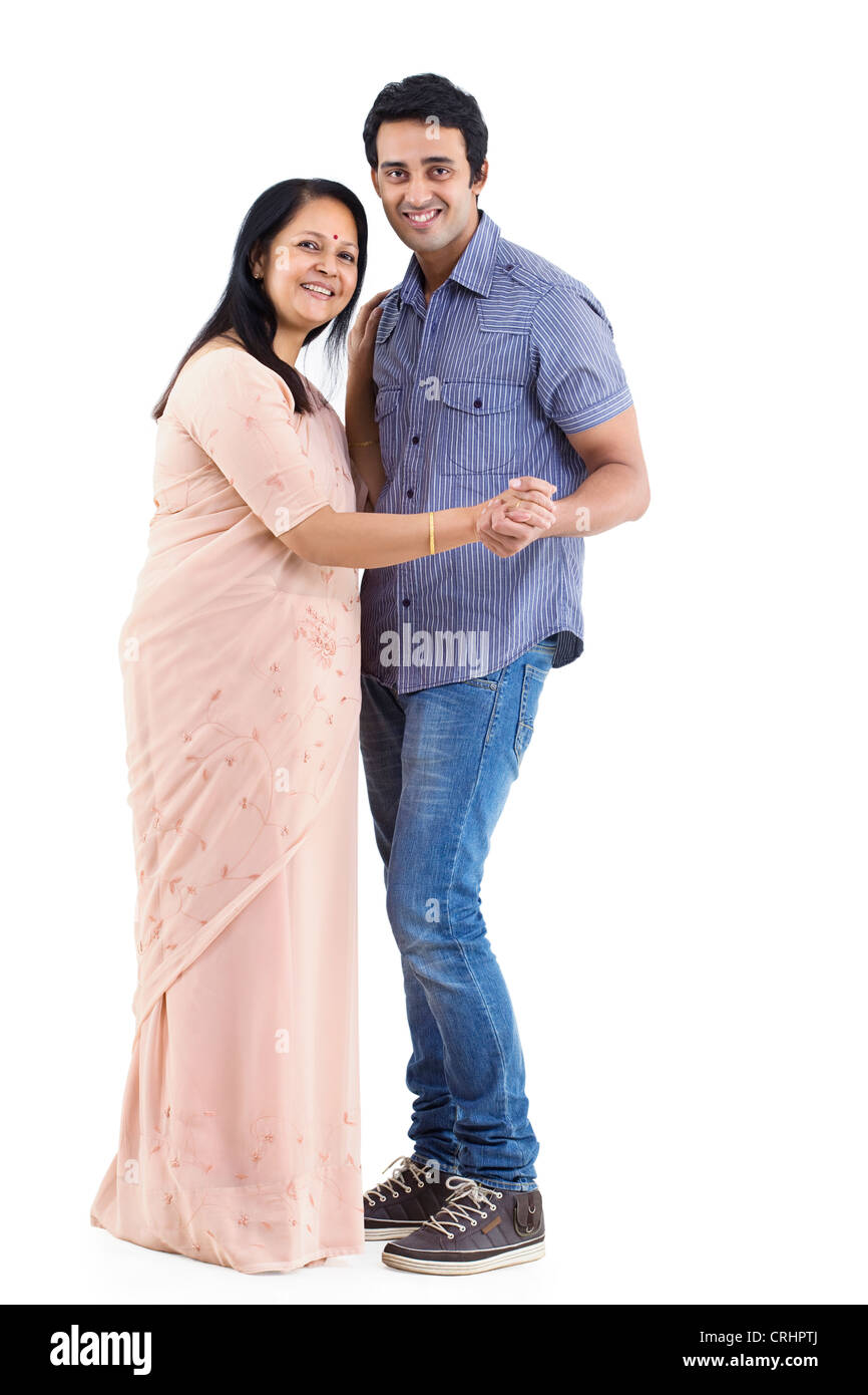 Porträt des jungen Mannes und Mutter tanzen über weißem Hintergrund Stockfoto