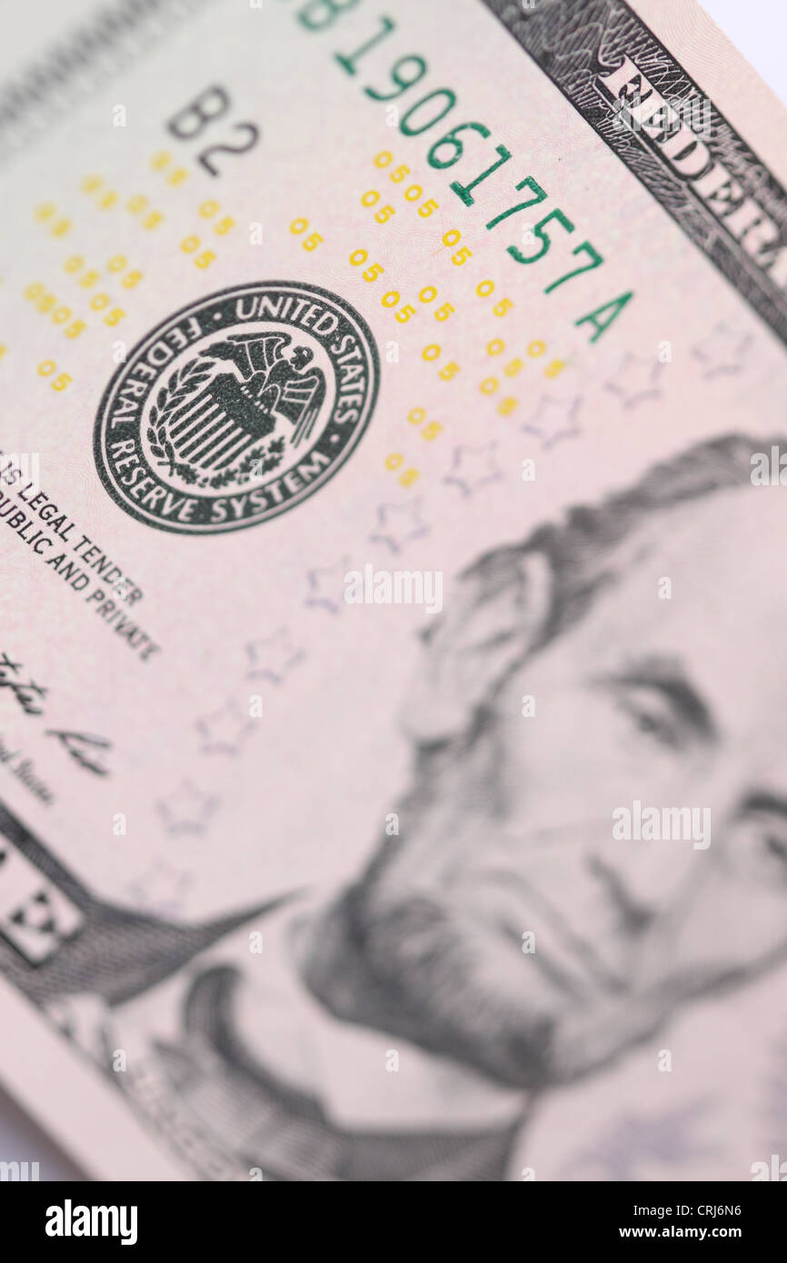 US-Federal Reserve System Logo auf einer 5 5 US $ Dollar Bill note Stockfoto