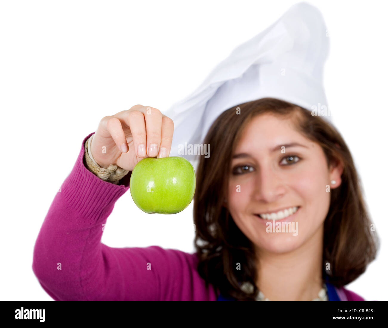 Köchin mit einem Apfel Stockfoto