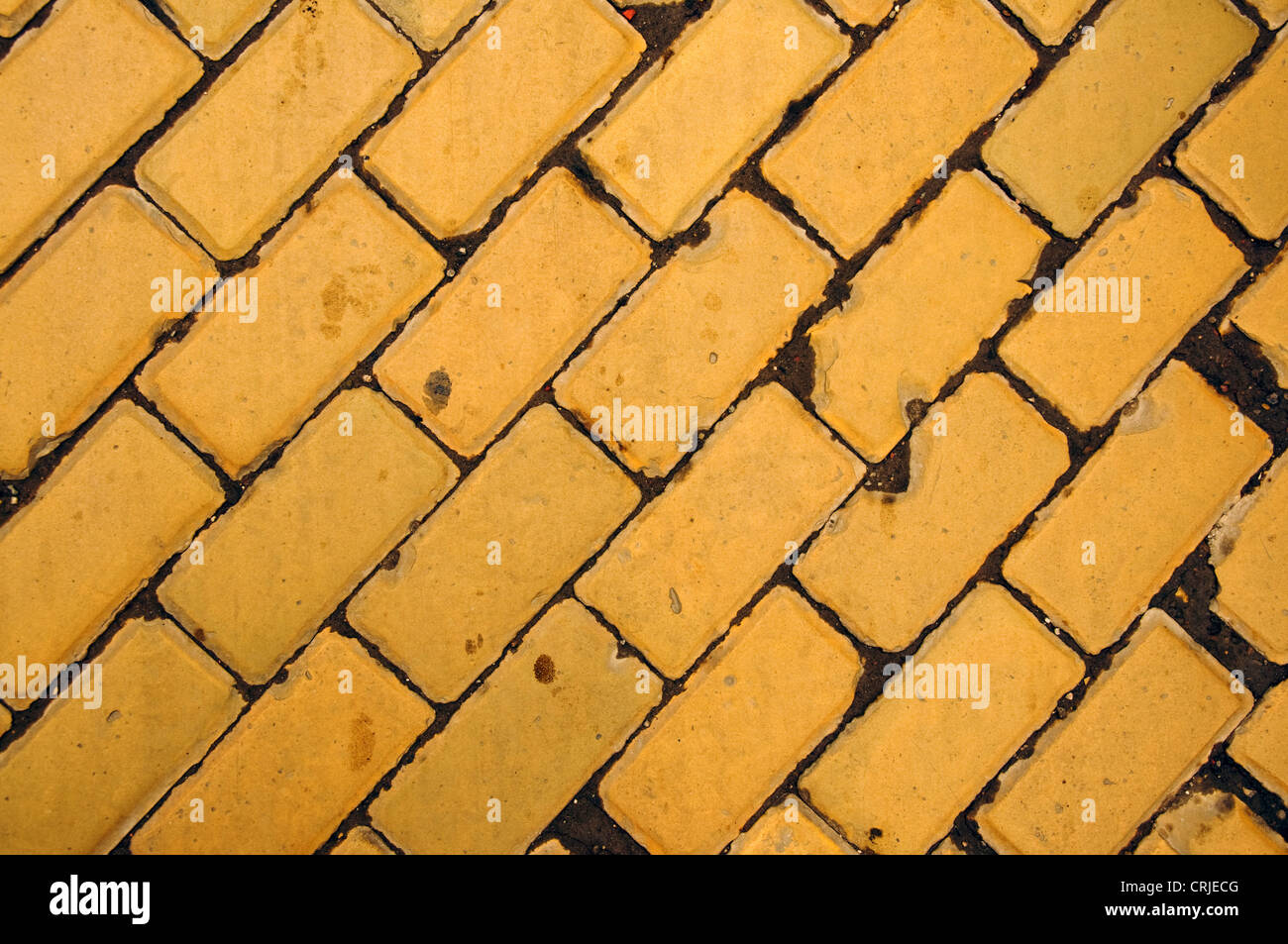 Gelbe Ziegel Bürgersteig, Hintergrundtextur Stockfoto