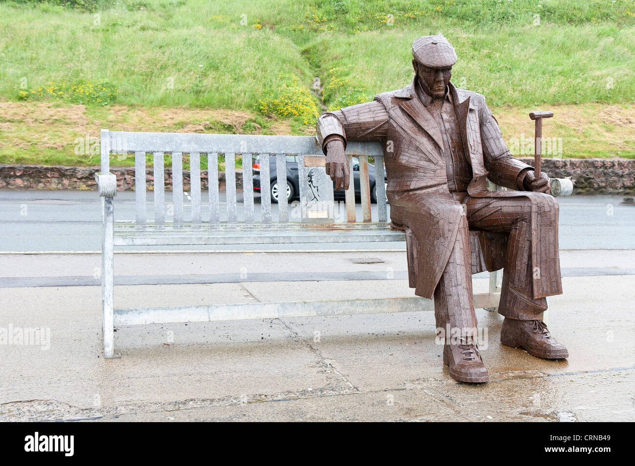 Freddie Gilroy Statue im Regen in Scarborough, Yorkshire, England Stockfoto