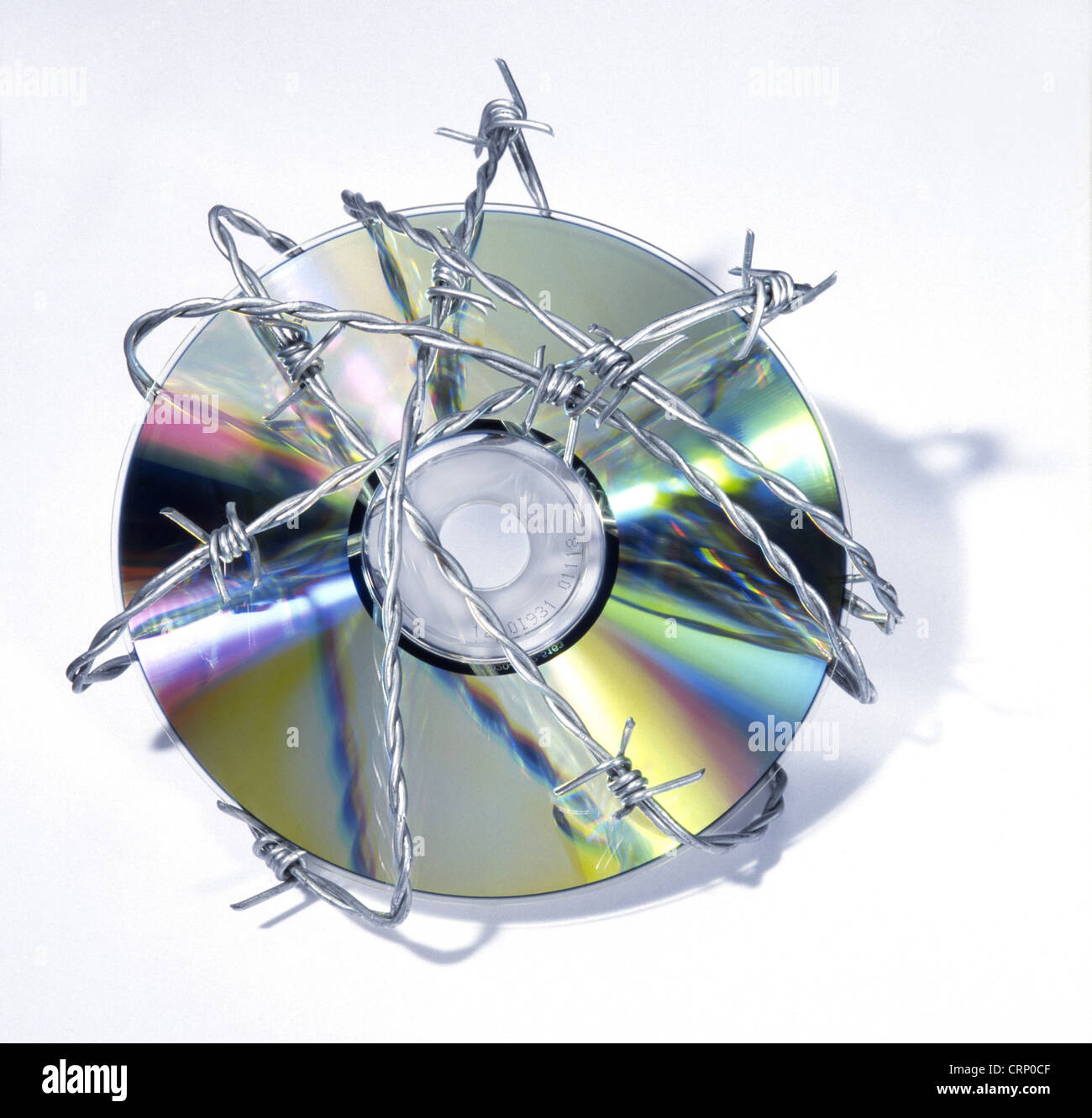 CD-ROM mit Stacheldraht gesichert Stockfoto
