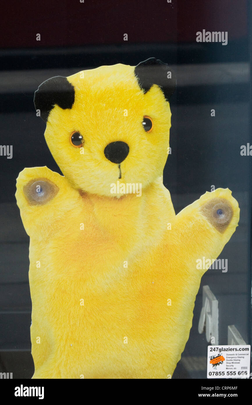 Sooty und fegen in einem Schaufenster in London England Stockfoto